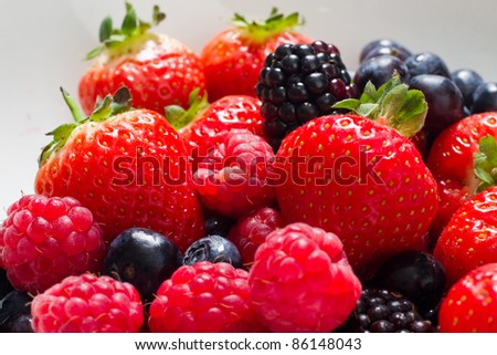Fresh fruit close up of strawberries and raspberries
