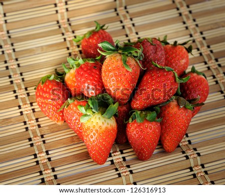 Close up of fresh strawberry on texture background