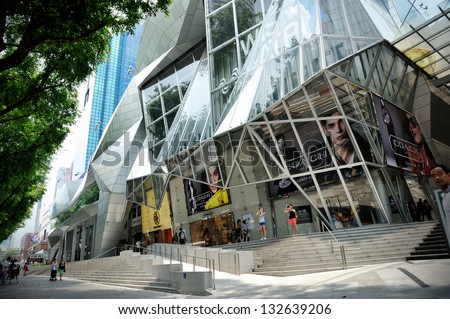 SINGAPORE - MAR 23 : Day view of Wisma Atria shopping mall on Orchard Road in Singapore on Mar 23, 2013 in Singapore. It is directly linked underground to Orchard MRT station (NS22).