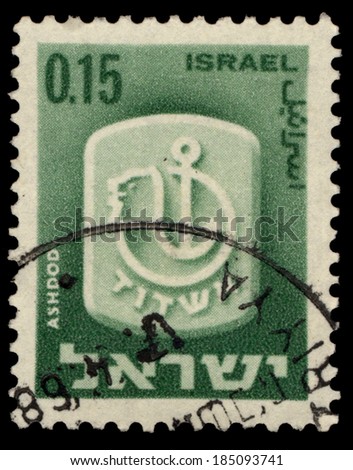 ISRAEL - CIRCA 1965: A stamp printed in Israel shows coat of arms of city Ashdod, circa 1965