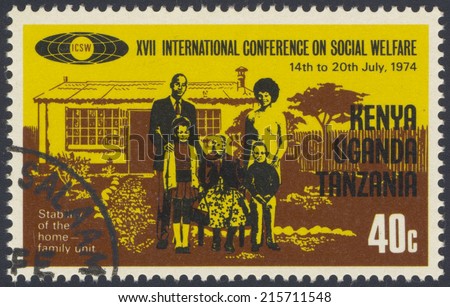 EAST AFRICAN COMMUNITY - CIRCA 1974: A stamp printed in East African Community, dedicated to the International Conference on Social Welfare, shows a family of five persons, circa 1974