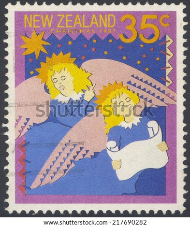NEW ZEALAND - CIRCA 1987: A stamp printed in New Zealand shows singing carols: Hark! The Herald Angels Sing, circa 1987