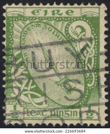 IRELAND - CIRCA 1922: A stamp printed in the Ireland shows Sword of Light, Shining Sword, from Irish and Scottish Folktales, circa 1922