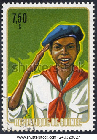REPUBLIC OF GUINEA - CIRCA 1975: A stamp printed in the Republic of Guinea, shows Salute, circa 1974