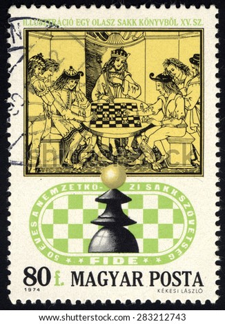 HUNGARY - CIRCA 1974: A stamp printed in Hungary shows Chess Players and 15th century English woodcut, circa 1974