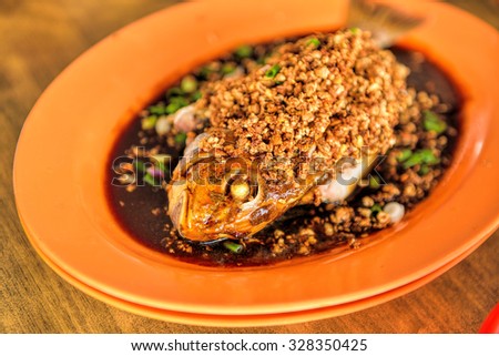Chinese steam fish with sweet sauce, selective focus.