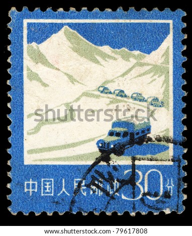 CHINA - CIRCA 1984: A stamp printed in China shows image of trucks come down from snow mountain, circa 1984