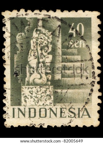 INDONESIA-CIRCA 1952: A stamp printed in Indonesia shows the sculpture of the god Shiva from Temple at Bedjoening, Bali, circa 1952.