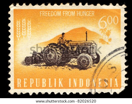 INDONESIA-CIRCA 1963: A stamp printed in Indonesia shows Harvest Truck, Freedom from Hunger,  circa 1963.