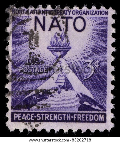 USA - CIRCA 1952 : A stamp printed in the USA shows North Atlantic Treaty Organization (NATO), Peace, Strenght, Freedom, circa 1952