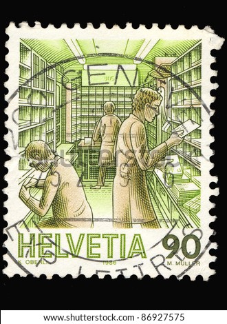 SWITZERLAND - CIRCA 1986: A stamp printed in Switzerland shows image of a postal sorting letter, circa 1986