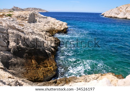 bright blue see and white shore in a sunny day