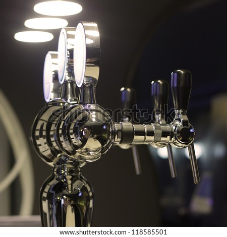 Beer taps in a bar for spilling drinks