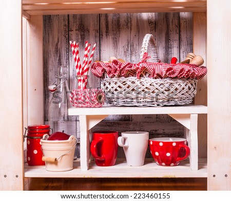 Shelves in the rack in the kitchen at shabby chic style