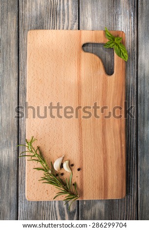 Recipe concept. Food advertisement, wooden board with spices for copy text