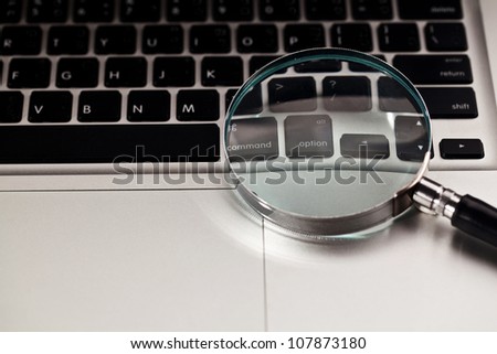 Magnifier on computer notebook , Concept of searching