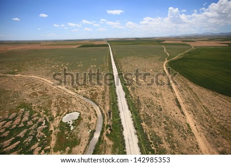 Aerial view of a green rural area under blue sky. Konya