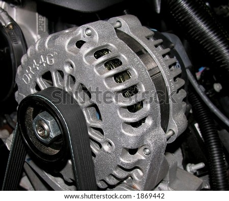 An Alternator used to power the electrical system on an automobile.