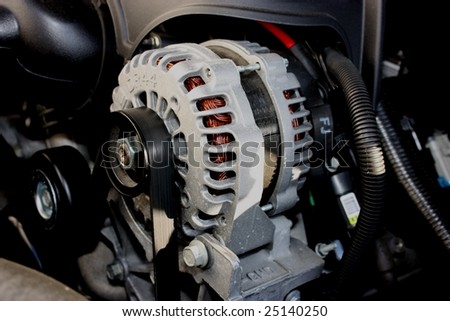 An Alternator used to power the electrical system on an automobile.