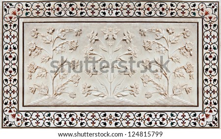 AGRA, INDIA - APRIL 10: Pattern on Taj Mahal on April 10, 2012 in Agra, India. Taj Mahal is widely recognized as the jewel of Muslim art and one of the universally masterpieces of the world