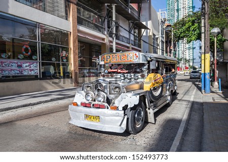 MANILA, PHILIPPINES - FEBRUARY 24: Jeepney on the street on February, 24, 2013, Manila, Philippines. Jeepneys are the most popular means of public transportation in the Philippines.