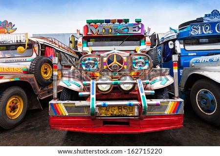 MANILA, PHILIPPINES - FEBRUARY 25: Jeepney on the bus station on February, 25, 2013, Manila, Philippines. Jeepney is a most popular public transport on Philippines.