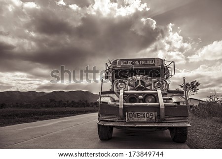 MANILA, PHILIPPINES - MARCH 15: Jeepney on the road on March, 15, 2013, Manila, Philippines. Jeepney is a most popular public transport on Philippines.