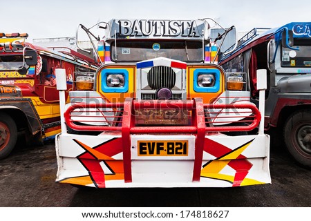 MANILA, PHILIPPINES - FEBRUARY 25: Jeepney on the bus station on February, 25, 2013, Manila, Philippines. Jeepney is a most popular public transport on Philippines.