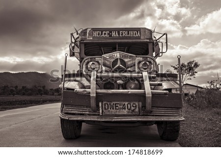MANILA, PHILIPPINES - MARCH 15: Jeepney on the road on March, 15, 2013, Manila, Philippines. Jeepney is a most popular public transport on Philippines.