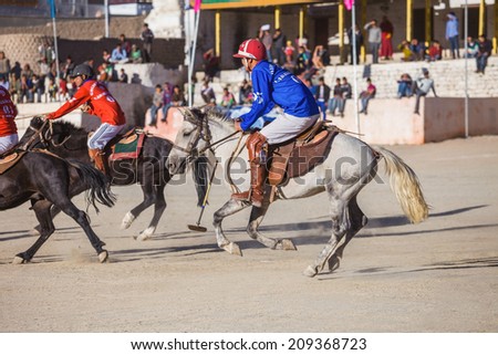 LEH, INDIA - SEPTEMBER 24: Unidentified polo players at the match on Leh\'s polo ground on September 24, 2013, Leh, India