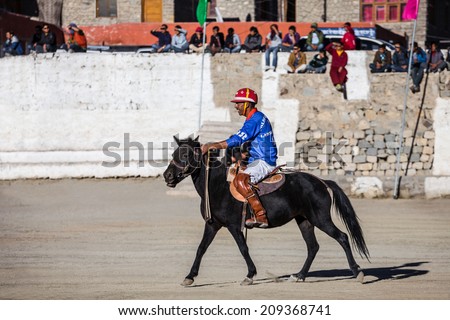 LEH, INDIA - SEPTEMBER 24: Unidentified polo players at the match on Leh\'s polo ground on September 24, 2013, Leh, India