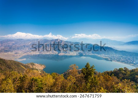 Aerial view to Phewa lake and Annapurna range from World Peace Pagoda in Pokhara, Nepal