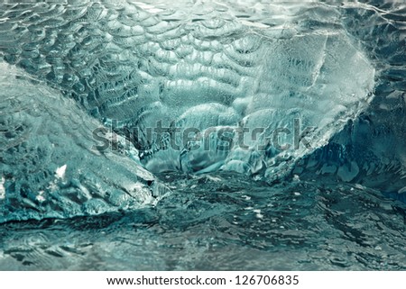 Pattern of black ice (very old ice block), west coast of Antarctic Peninsula - ideal as background image