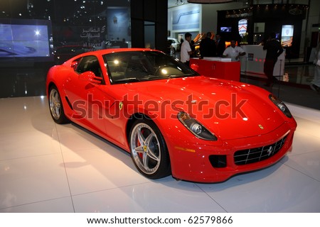 stock photo DUBAI UAE DECEMBER 16Red Ferrari on Dubai Motor Show