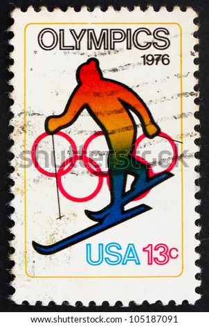 UNITED STATES OF AMERICA - CIRCA 1976: a stamp printed in the USA shows Skiing and Olympic Rings, 12th Winter Olympic Games, Innsbruck, Austria, circa 1976