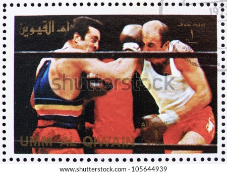 UMM AL-QUWAIN - CIRCA 1972: a stamp printed in the Umm al-Quwain shows Boxing, Olympic Sport, Olympic Games of the past, circa 1972