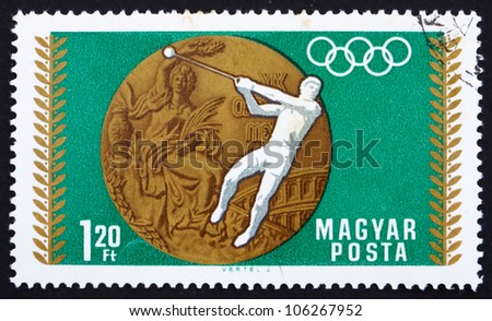 HUNGARY - CIRCA 1969: A stamp printed in the Hungary shows Hammer Throwing, Summer Olympic sports, Mexico 68, circa 1969