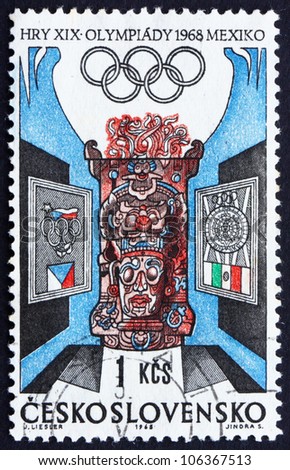 CZECHOSLOVAKIA - CIRCA 1968: a stamp printed in the Czechoslovakia shows Czechoslovak and Mexican Olympic Emblems and Carved Altar, Summer Olympic sports, Mexico 68, circa 1968