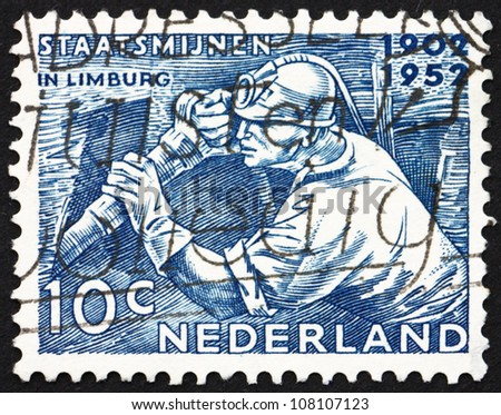 NETHERLANDS - CIRCA 1952: a stamp printed in the Netherlands shows Miner at Work, 50th Anniversary of the Founding of Netherlands Mining Industry, circa 1952