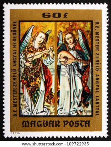HUNGARY - CIRCA 1973: a stamp printed in the Hungary shows Angels Playing Violin and Lute, Painting by Hungarian Anonymous Early Master, from the Christian Museum at Esztergom, circa 1973