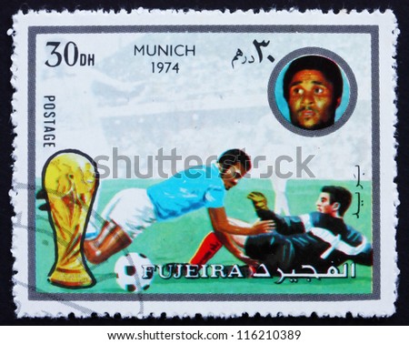 FUJEIRA - CIRCA 1972: A stamp printed in the Fujeira shows Football Scene, Football World Championship 1974, Germany, circa 1972