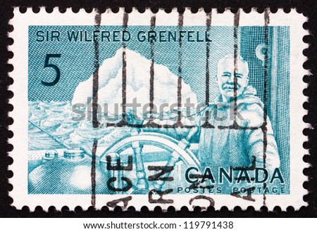 CANADA - CIRCA 1965: a stamp printed in the Canada shows Sir Wilfred Grenfell at Wheel of Hospital Ship Strathcona II, Author, Medical Missionary, circa 1965