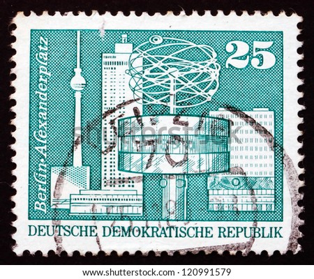 GDR - CIRCA 1973: a stamp printed in GDR shows World Clock, Alexander Square, Berlin, circa 1973