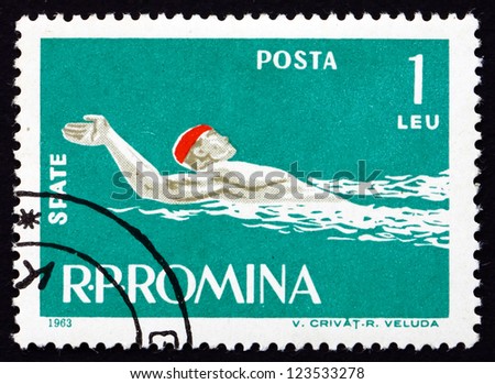 ROMANIA - CIRCA 1963: a stamp printed in the Romania shows Man Swims Backstroke Style, circa 1963