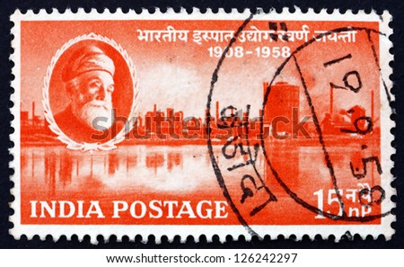 INDIA - CIRCA 1958: a stamp printed in India shows Jamsetji Nusserwanji Tata and Steel Works, Jamshedpur, 50th Anniversary of Indian Steel Industry, circa 1958