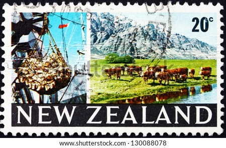 NEW ZEALAND - CIRCA 1969: a stamp printed in the New Zealand shows Cargo Hoist and Grazing Cattle, circa 1969