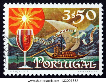 PORTUGAL - CIRCA 1970: a stamp printed in the Portugal shows Glass of Wine and Barge with Barrels on River Douro, Port Wine Export, circa 1970