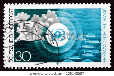 GERMANY - CIRCA 1973: a stamp printed in the Germany shows Environment Emblem and pollution of the Water, Nature and Environmental Protection, circa 1973