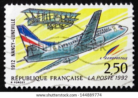 FRANCE - CIRCA 1992: a stamp printed in the France shows First Mail Flight from Nancy to Luneville, 80th Anniversary, circa 1992
