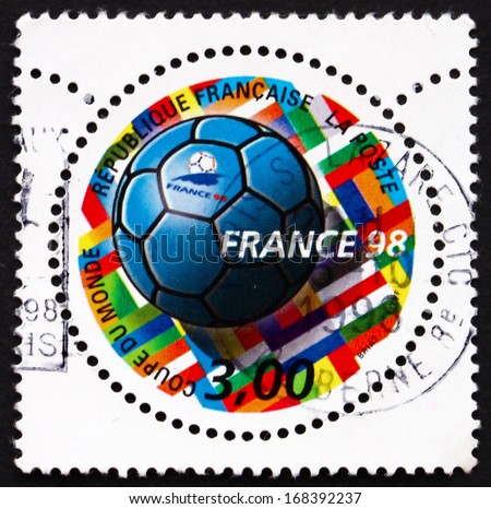 FRANCE - CIRCA 1998: a stamp printed in the France shows Soccer Ball and Flags, 1998 World Cup Soccer Championships, France, circa 1998